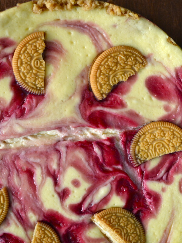 This Golden Oreo Crust Raspberry Cheesecake is quite the decadent treat! If you want to impress your friends and family with a delicious sinful dessert, you have to give them this!