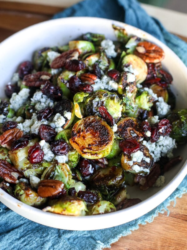 Savor Cranberry Pecan Brussels Sprouts—roasted to perfection with tart cranberries and crunchy pecans for a festive side!