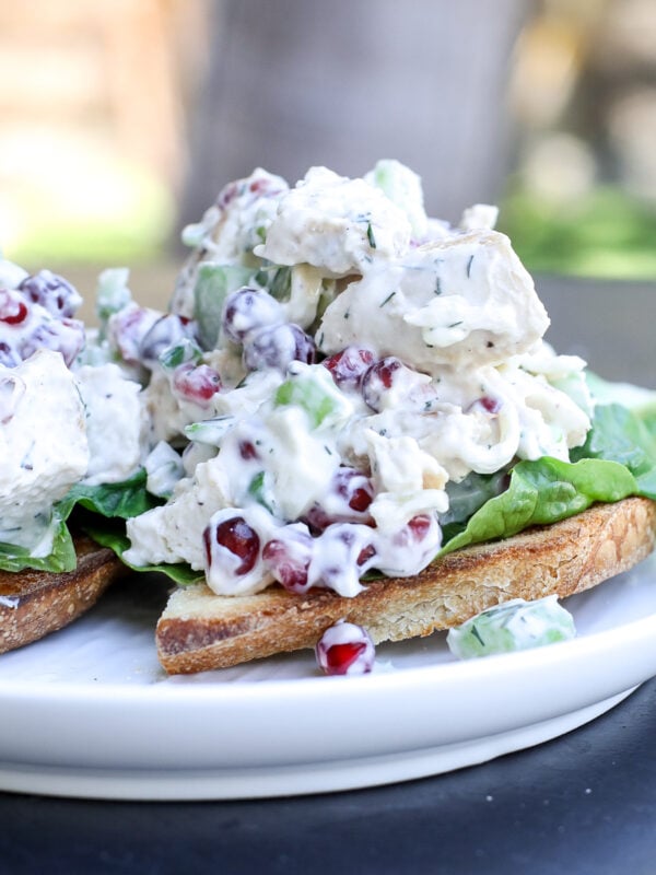Fresh & flavorful Pomegranate Chicken Salad! Healthy, easy, and packed with juicy pomegranate seeds and a light yogurt dressing.