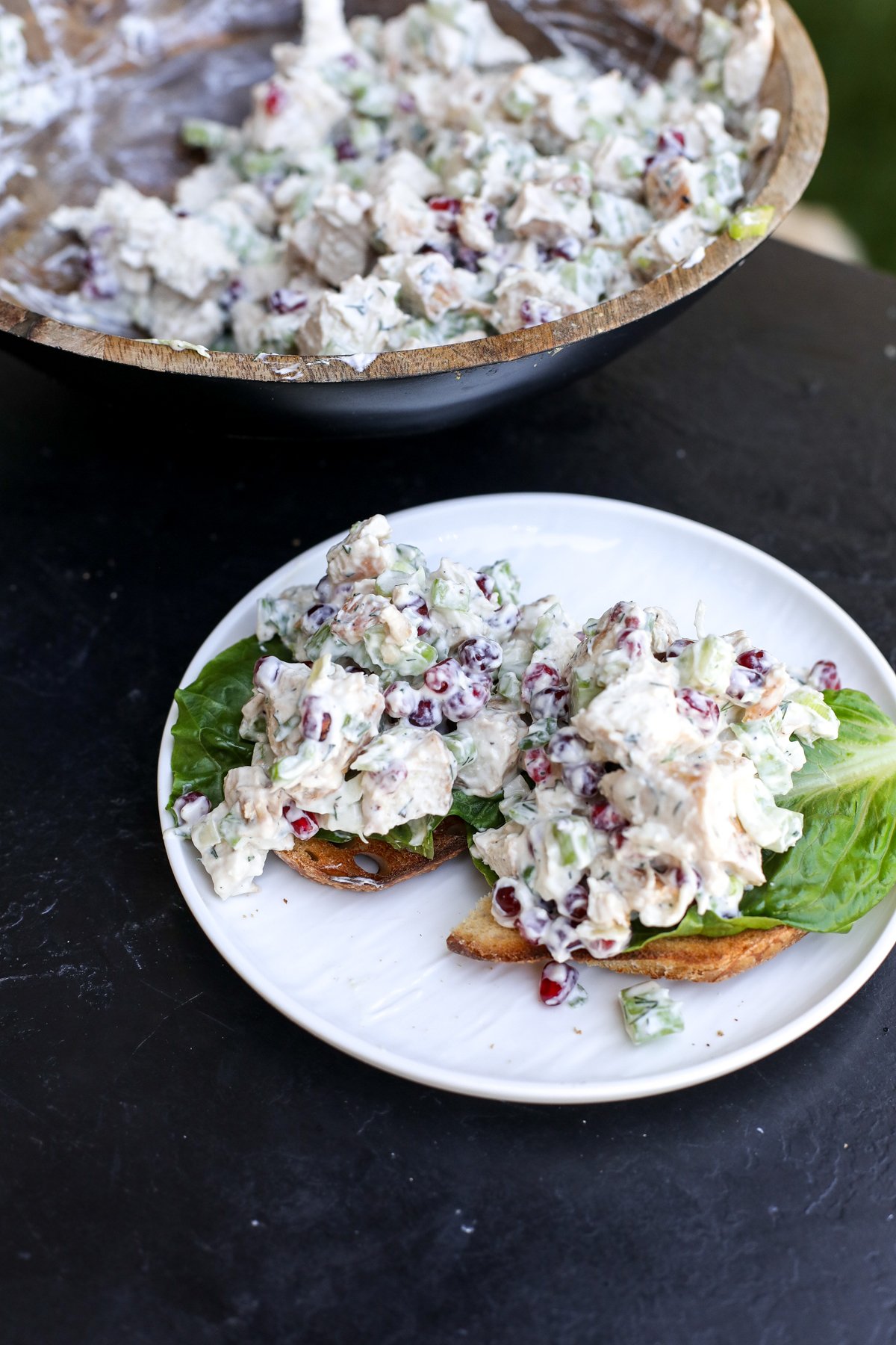 Fresh & flavorful Pomegranate Chicken Salad! Healthy, easy, and packed with juicy pomegranate seeds and a light yogurt dressing.
