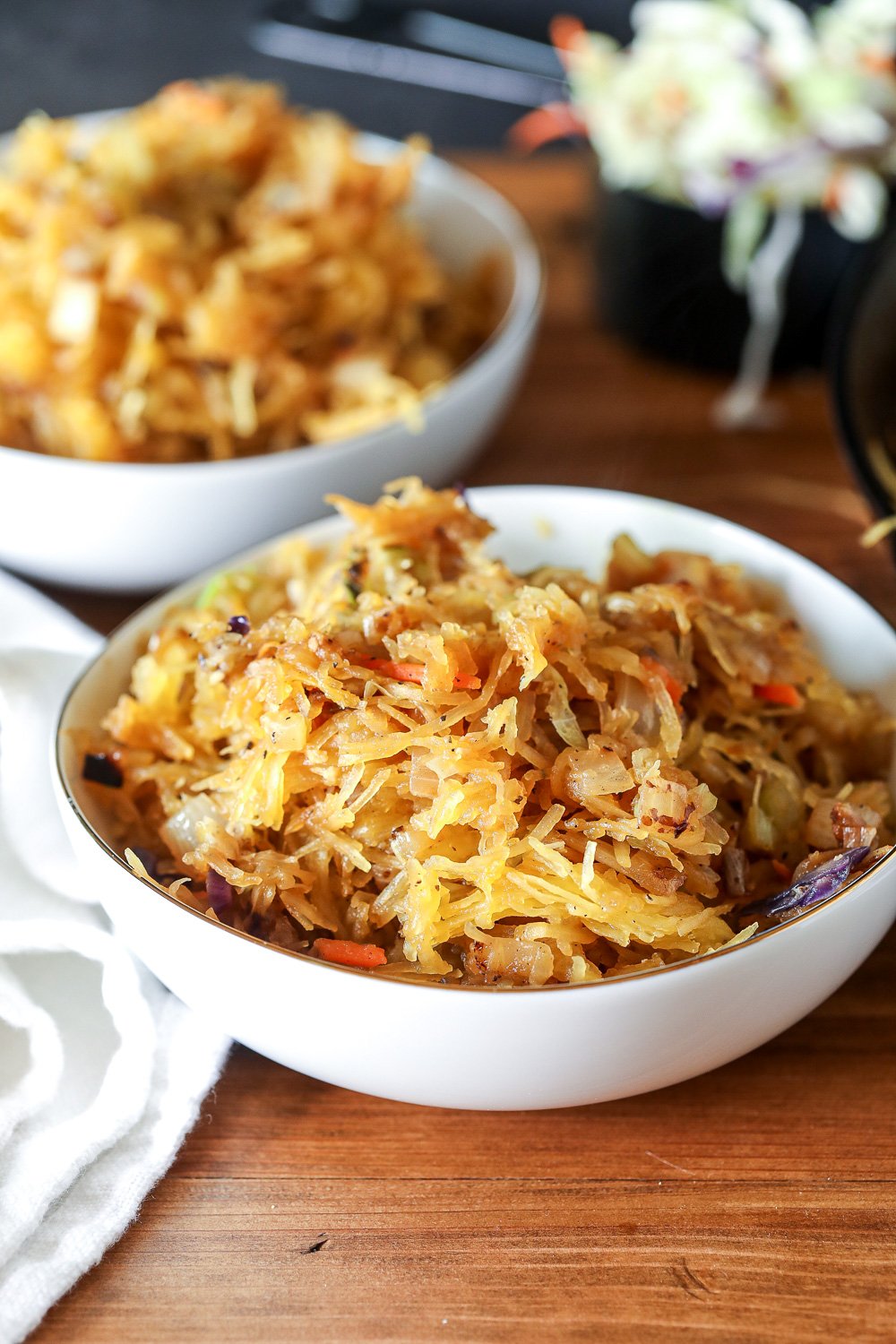 This Spaghetti Squash Chow Mein is so perfect if you are craving noodles but don't want to eat all those carbs! Whole30 and Paleo Compliant.