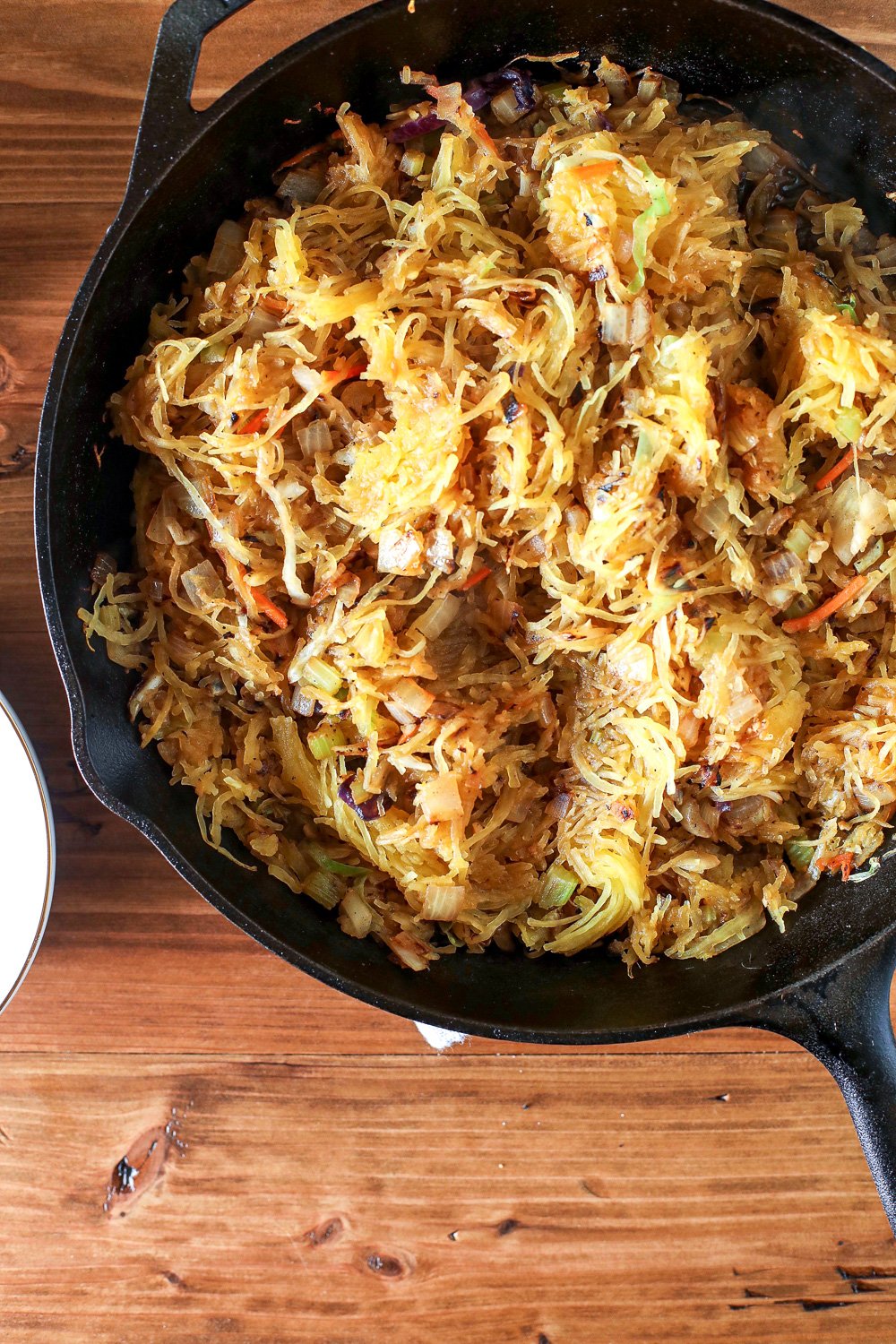 This Spaghetti Squash Chow Mein is so perfect if you are craving noodles but don't want to eat all those carbs! Whole30 and Paleo Compliant.