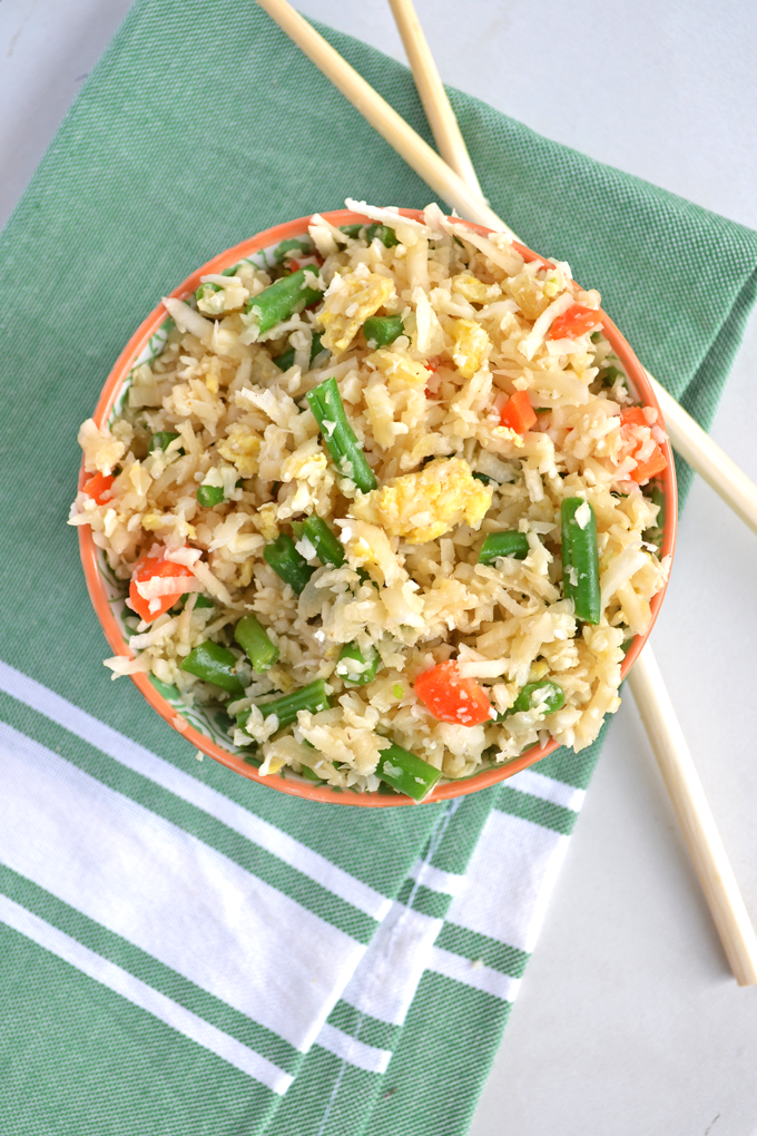 This Cauliflower Fried Rice recipe is paleo & whole30 approved!! Super quick to throw together - click through for a video!