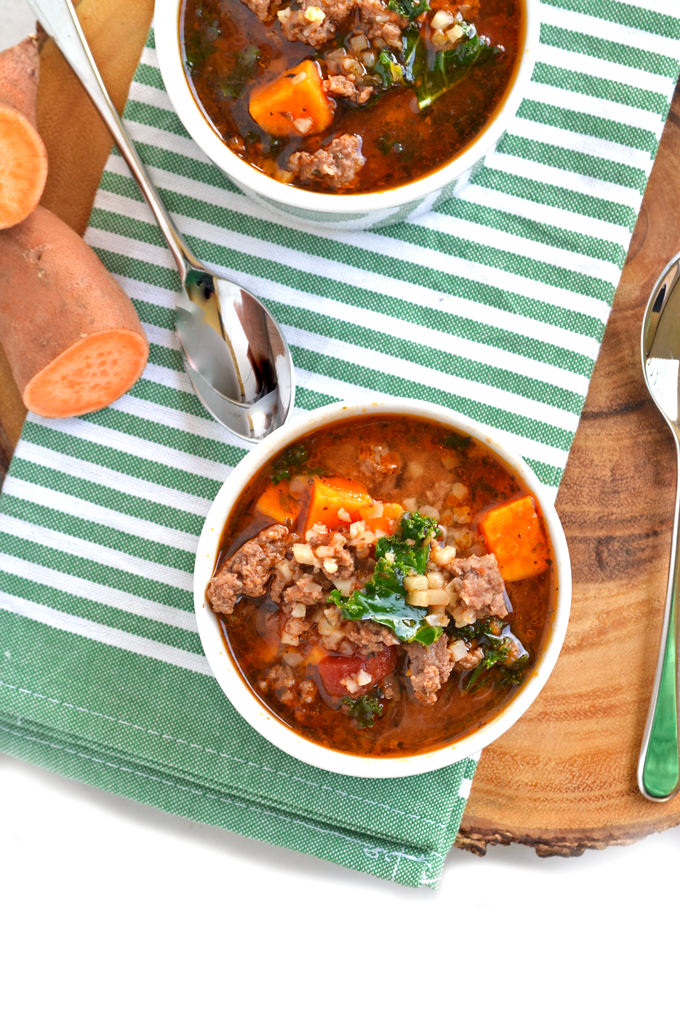 This Italian Beef & Cauliflower Rice Soup is super hearty and filling for any whole 30, paleo or just all around healthy meal! Tons of spices just it great flavor, cauliflower rice adds bulk and sweet potatoes & kale are just the perfect finishing touch!