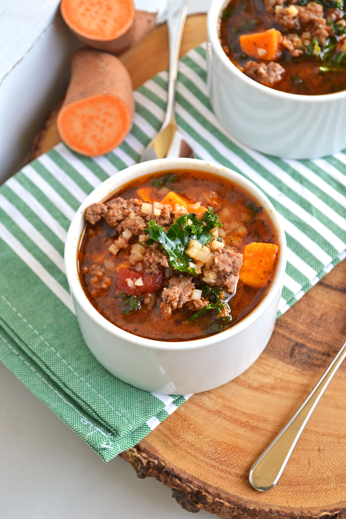 This Italian Beef & Cauliflower Rice Soup is super hearty and filling for any whole 30, paleo or just all around healthy meal! Tons of spices just it great flavor, cauliflower rice adds bulk and sweet potatoes & kale are just the perfect finishing touch!