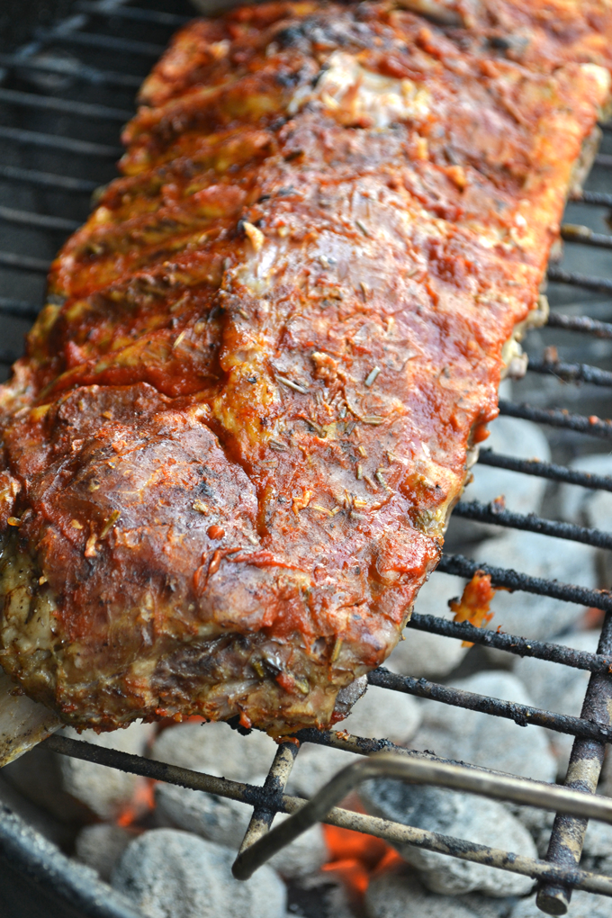 This BBQ Rib recipe is perfect for any time of year! The BBQ Sauce is sugar free, whole30 approved and paleo. The recipe also breaks down the perfect way to achieve fall off the bone ribs!