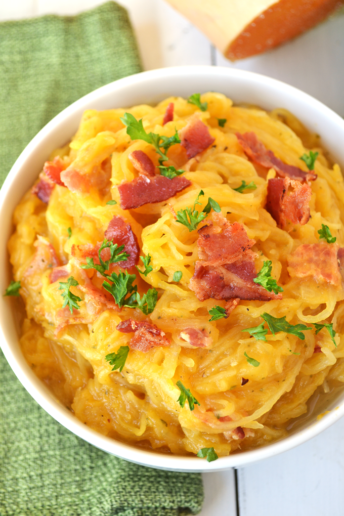 This Spaghetti Squash w/ Creamy Butternut Sage Sauce is such a delicious whole30 approved and Paleo meal!! You can even take out the bacon to make it Vegan! So full of flavor and easy to make.