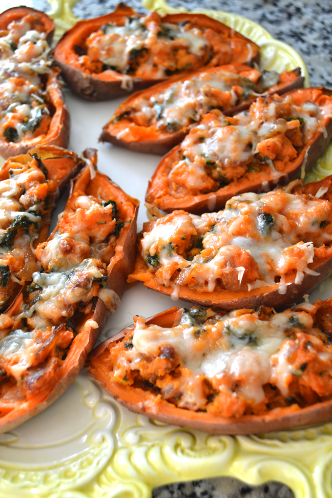 These Caramelized Onion & Kale Twice Baked Sweet Potatoes are packed with flavor and topped with gruyere cheese! 