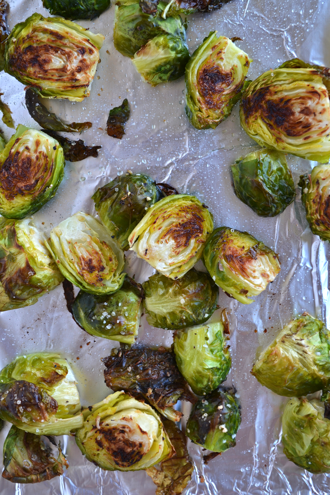 Lemon & Sun-Dried Tomato Brussels Sprouts! This recipe is full of flavor, paleo and Whole 30 approved! Such a fun way to mix up this side dish!