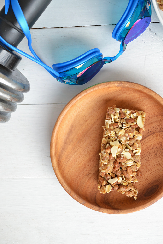 These Protein Packed Granola Bars are refined sugar free and gluten free! Almonds, nut butter & protein powder make these perfect for a pre-workout snack!