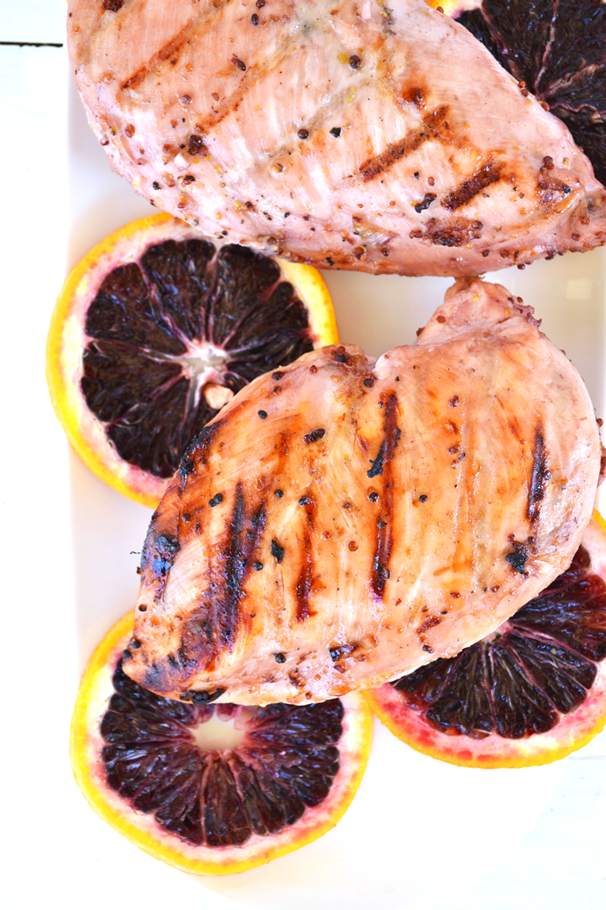 Blood Orange Marinated Chicken - perfect for grilling season! This quick marinade also becomes a sauce for after the chicken is cooked. Paleo, Whole 30 and so delicious!