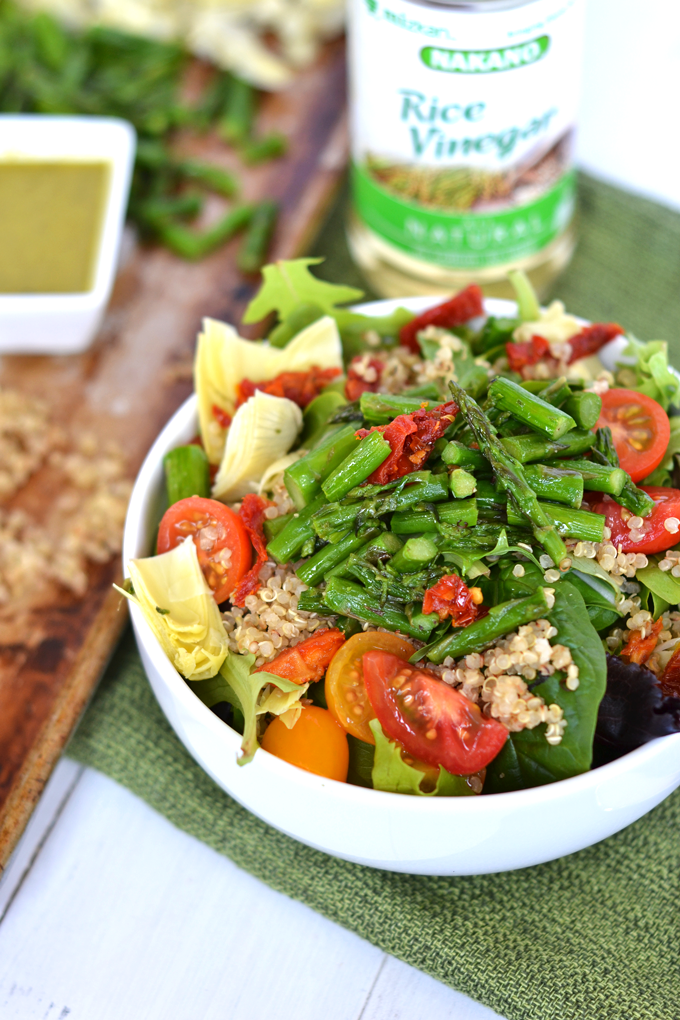 This Asparagus & Quinoa Salad with Pesto Vinaigrette is a simple and perfect salad full of flavor and nutrients! Using Rice Vinegar gives the dressing a perfectly subtle punch!