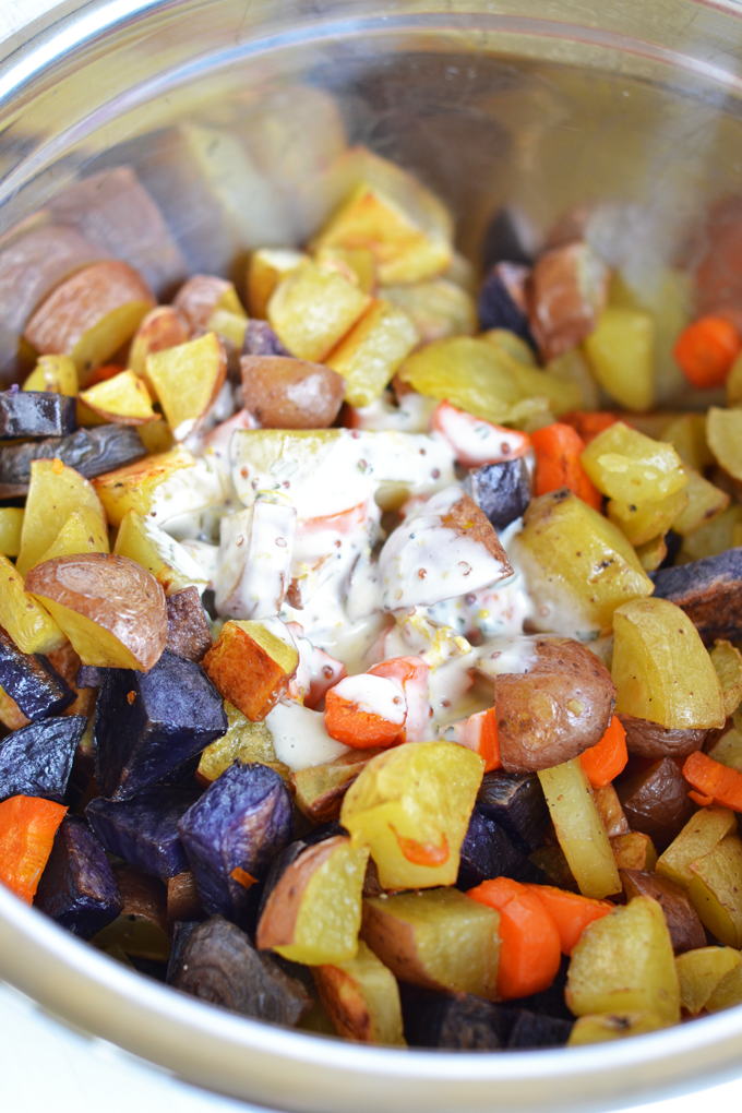 This Tarragon Roasted Potato & Carrot Salad is the perfect side dish for any occasion! Full of flavor with a light dressing that doesn't weigh you down. Whole30 compliant and paleo make for a healthy dish!