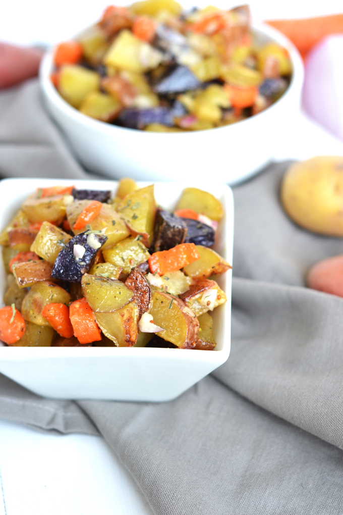 This Tarragon Roasted Potato & Carrot Salad is the perfect side dish for any occasion! Full of flavor with a light dressing that doesn't weigh you down. Whole30 compliant and paleo make for a healthy dish!