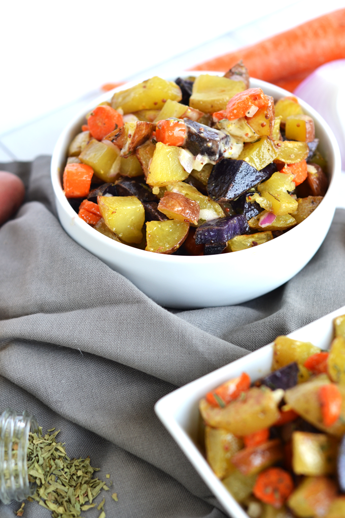 This Tarragon Roasted Potato & Carrot Salad is the perfect side dish for any occasion! Full of flavor with a light dressing that doesn't weigh you down. Whole30 compliant and paleo make for a healthy dish!