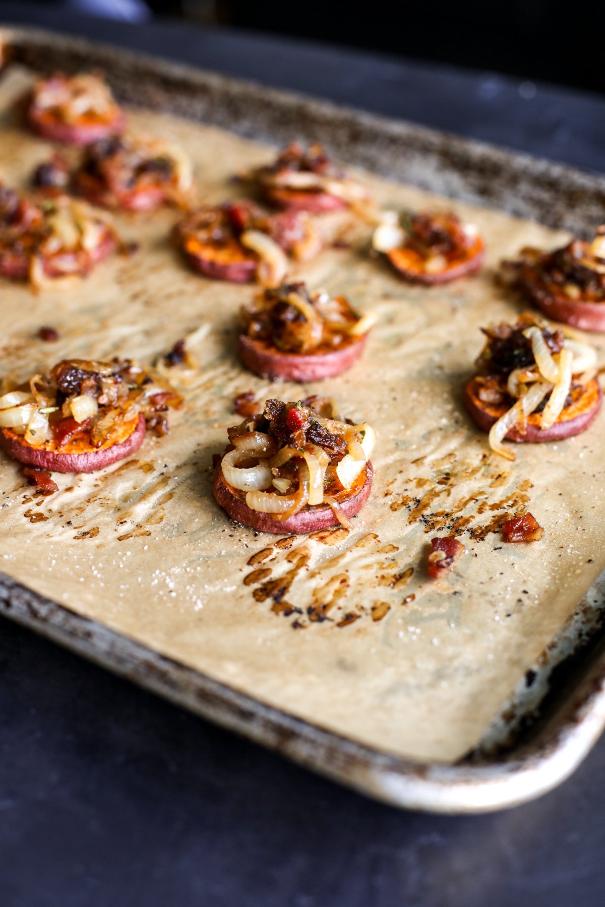 Caramelized Onion Bacon Compote Crostini: Perfect appetizer! Sweet potato base, savory topping. Easy recipe for any gathering.