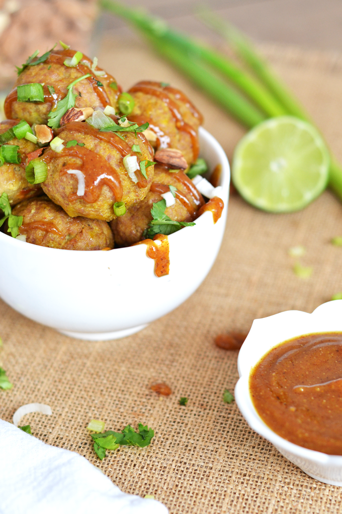 These Curry Thai Turkey Meatballs are super easy to throw together, Whole30, Paleo and packed with flavor and protein. A quick curry and almond butter sauce compliment them perfectly!