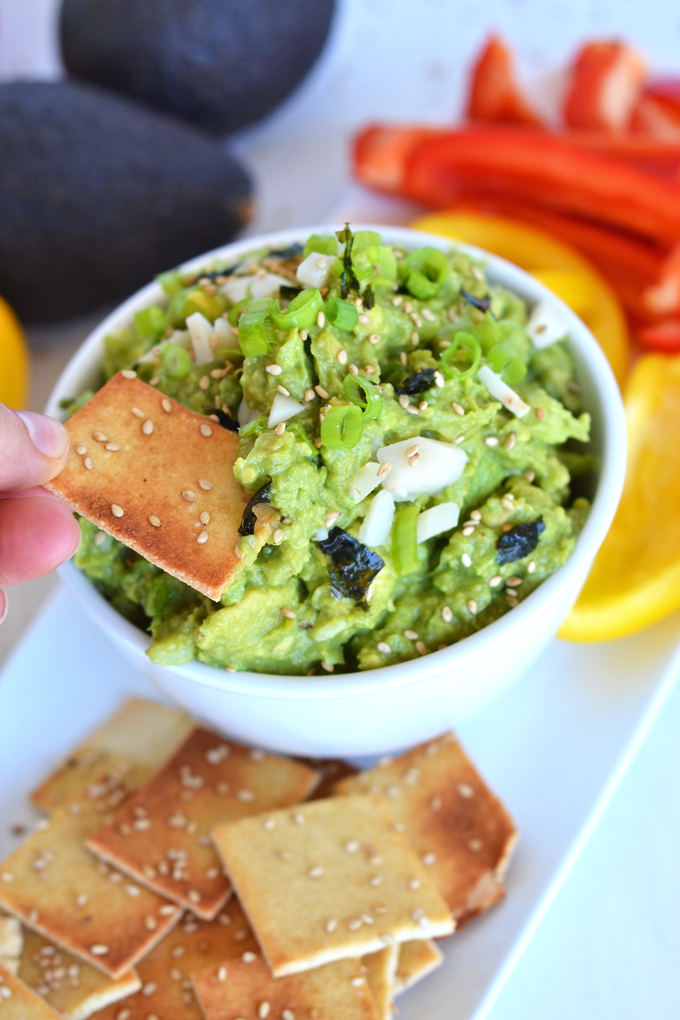 Want a new twist of guacamole? This Asian Guacamole has just a few ingredients and goes great as a dip or topping to any asian inspired meal! It is Whole30 and Paleo approved!