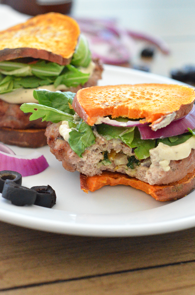 These Greek Stuffed Turkey Burgers are Paleo, Whole30 compliant and packed with greek flavor! Sweet Potato Toast for buns makes this a low card option!