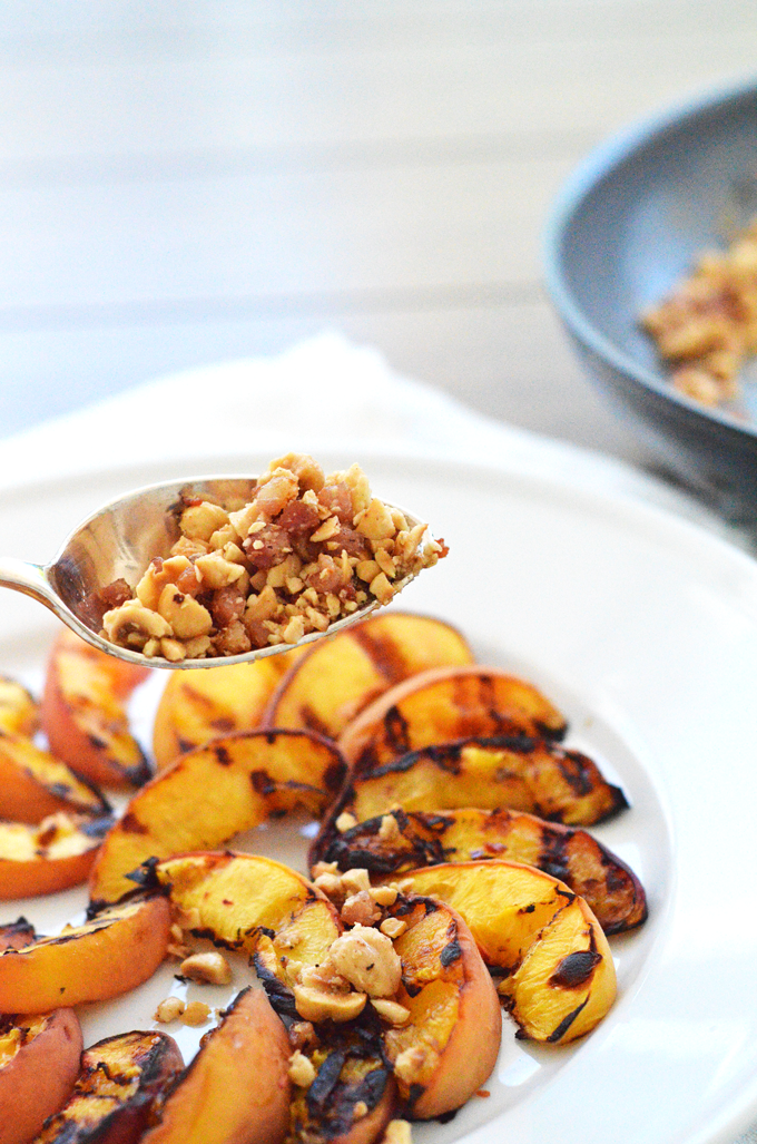 Grilled Peaches with Hazelnut Pancetta Crumble! A perfect summer dessert or appetizer for a dinner party or celebration! A paleo and whole30 option for everyone to enjoy!