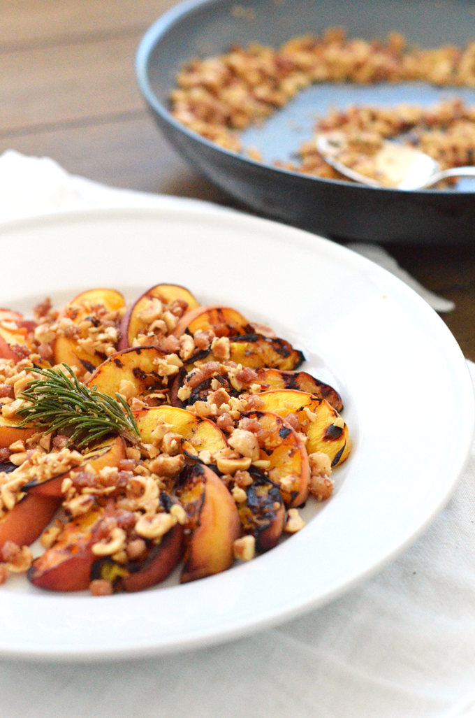 Grilled Peaches with Hazelnut Pancetta Crumble! A perfect summer dessert or appetizer for a dinner party or celebration! A paleo and whole30 option for everyone to enjoy!