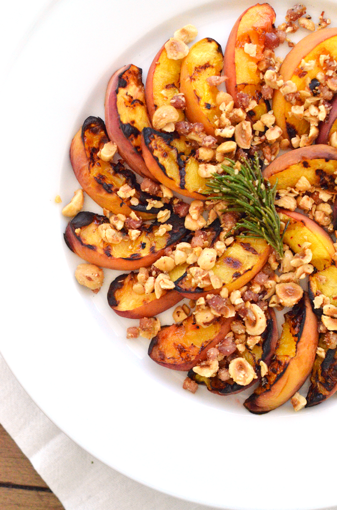 Grilled Peaches with Hazelnut Pancetta Crumble! A perfect summer dessert or appetizer for a dinner party or celebration! A paleo and whole30 option for everyone to enjoy!