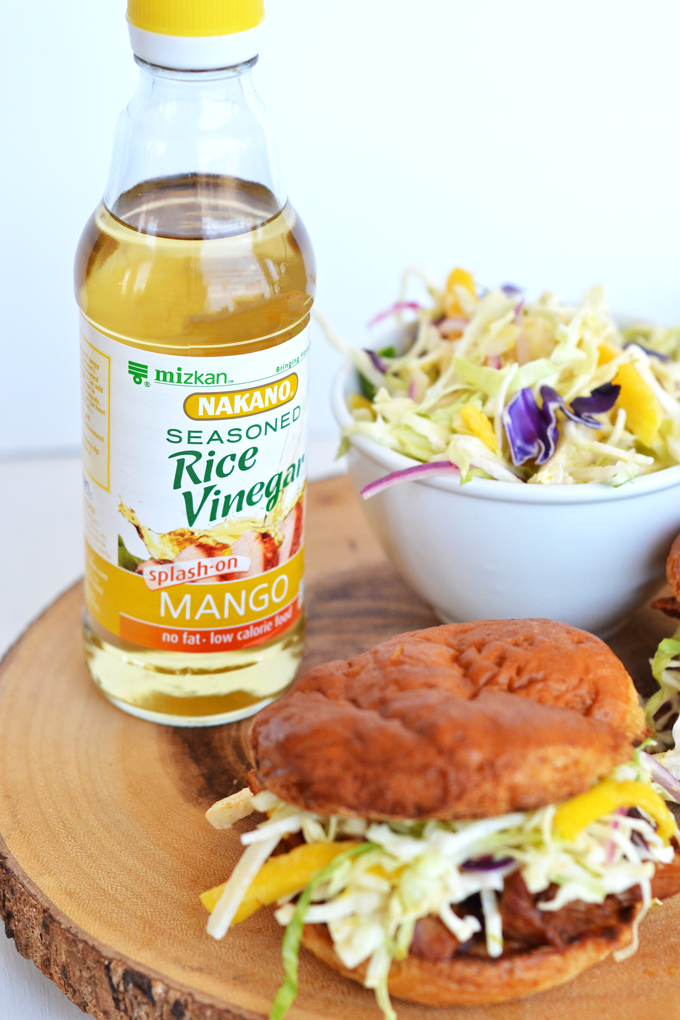 This Mango Jicama Coleslaw is a perfect side dish or topping for a pulled pork sandwich! Nakano Mango Rice Vinegar adds tons of Mango flavor!