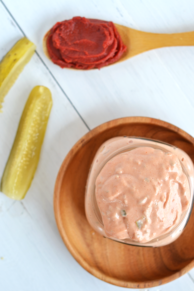 Looking for a clean sauce to top your burgers? This Clean Thousand Island Sauce is paleo & Whole30 approved for all of your favorite grilled foods!