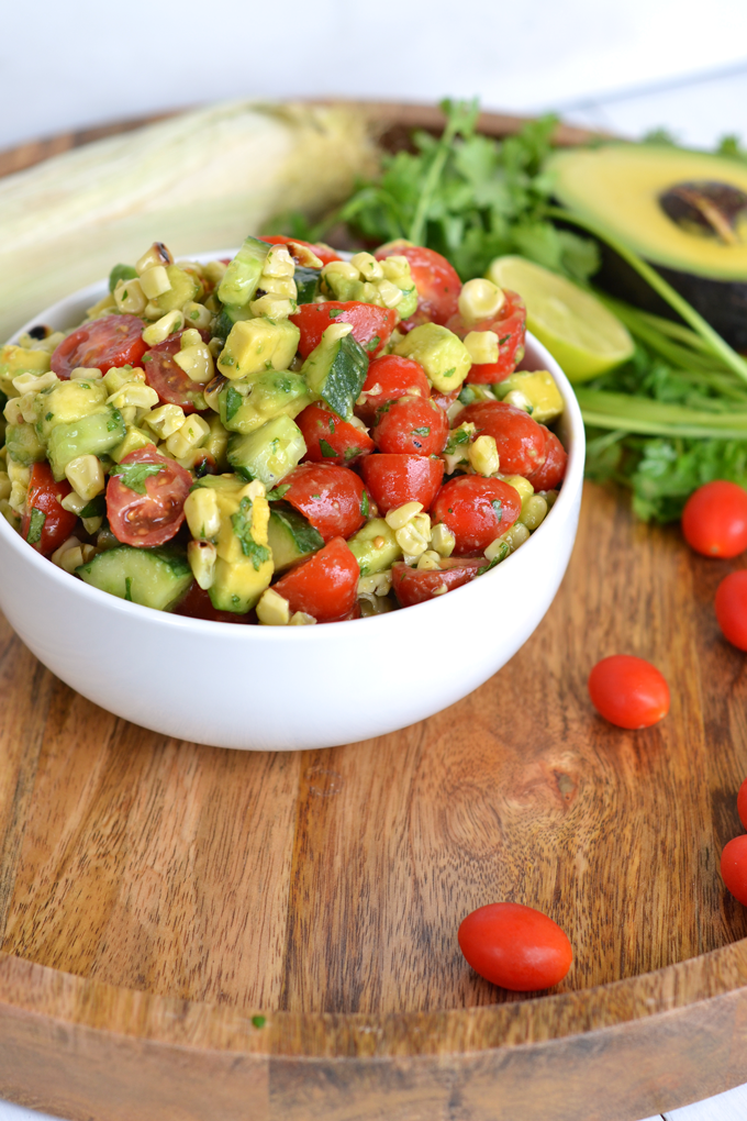 This Grilled Corn and Avocado Salad is the perfect healthy side dish for any party!