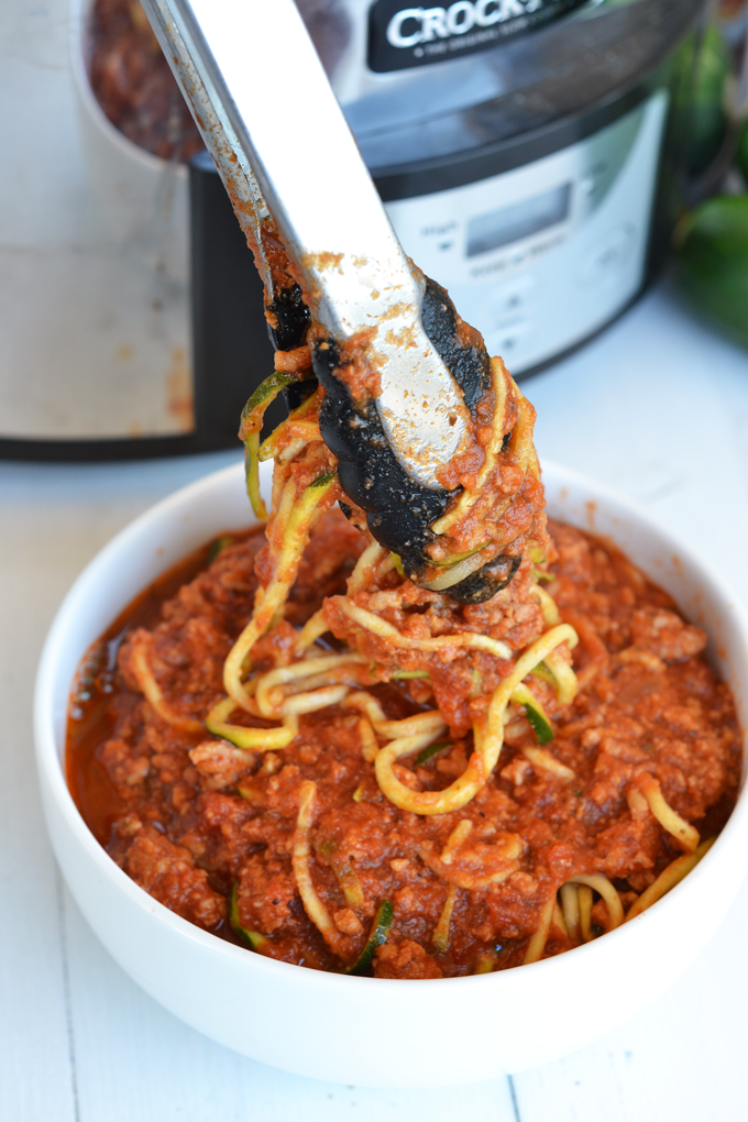 This Slow Cooker Turkey Bolognese and Zucchini Noodles are the perfect quick, easy and healthy weeknight meal! Just a few ingredients and it is Paleo & Whole30 compliant!