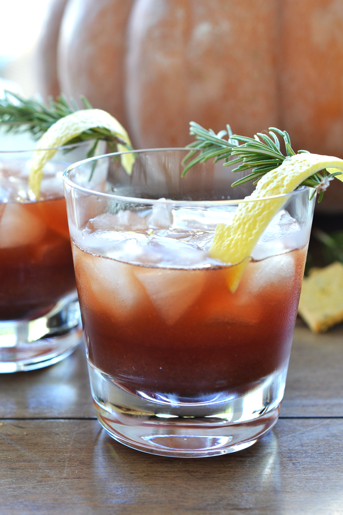 This Rosemary Berry Bourbon Buzz is a perfect fall cocktail! The simple syrup is made with coconut sugar and infused with rosemary for a healthy cocktail option!