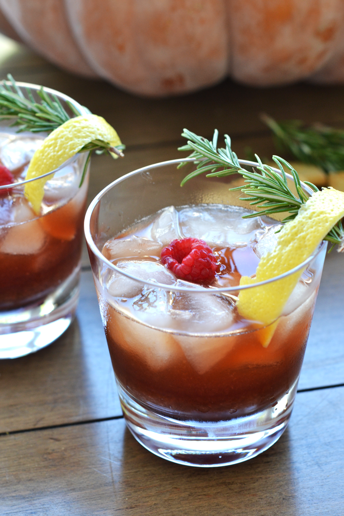 This Rosemary Berry Bourbon Buzz is a perfect fall cocktail! The simple syrup is made with coconut sugar and infused with rosemary for a healthy cocktail option!