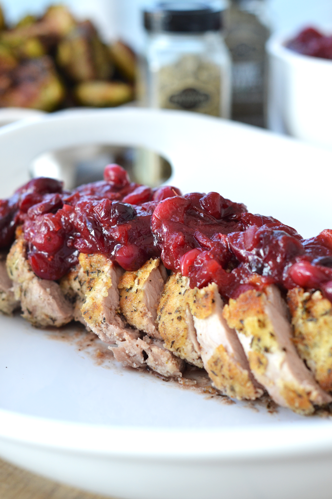 This Herb Crusted Pork Tenderloin w/ Cranberry Chutney is the perfect friendsgiving or thanksgiving dish!! The dish is paleo and delicious for everyone to enjoy!