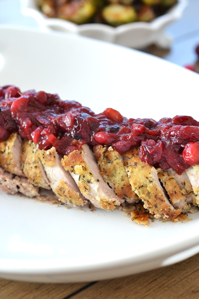 This Herb Crusted Pork Tenderloin w/ Cranberry Chutney is the perfect friendsgiving or thanksgiving dish!! The dish is paleo and delicious for everyone to enjoy!