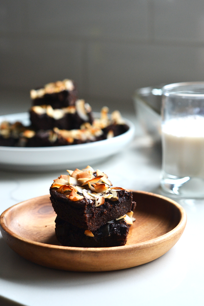 These Coconut Crusted Cacao Brownies are grain free and oil free! The healthy fat comes from avocado and they are sweetened with maple syrup!