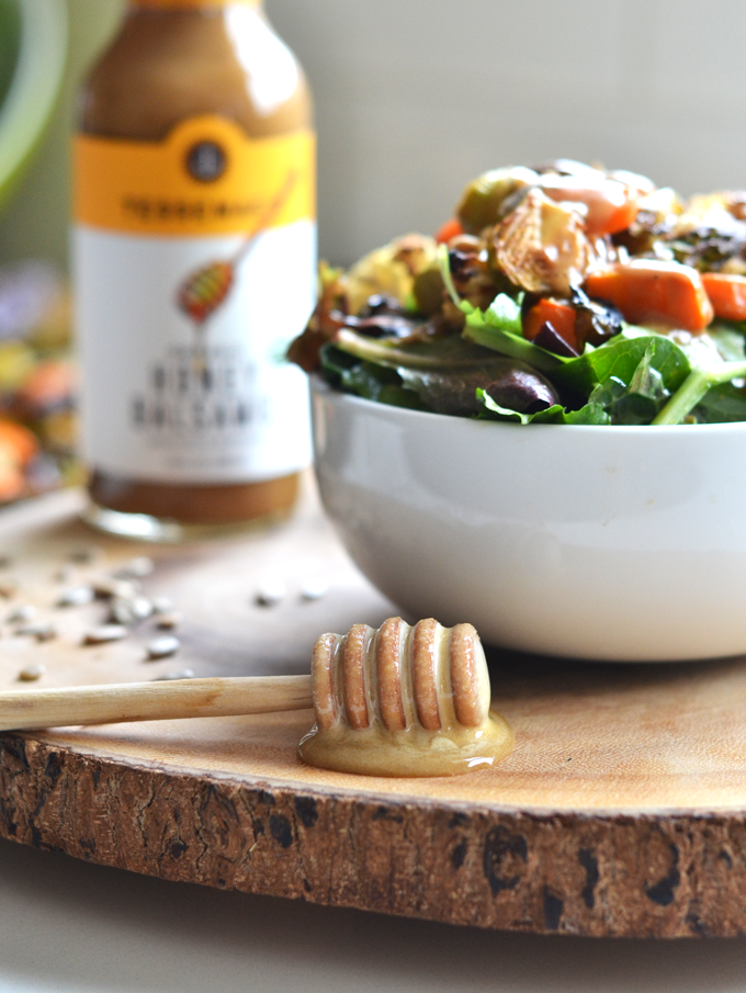 This Honey Balsamic Roasted Veggie Salad is a perfect way to get those vegetables in while tasting delicious! It is a paleo option that is vegetarian but you can easily add meat to make it a full meal!