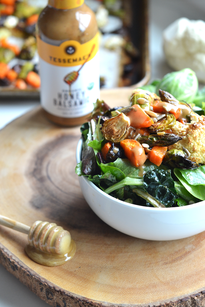 This Honey Balsamic Roasted Veggie Salad is a perfect way to get those vegetables in while tasting delicious! It is a paleo option that is vegetarian but you can easily add meat to make it a full meal!