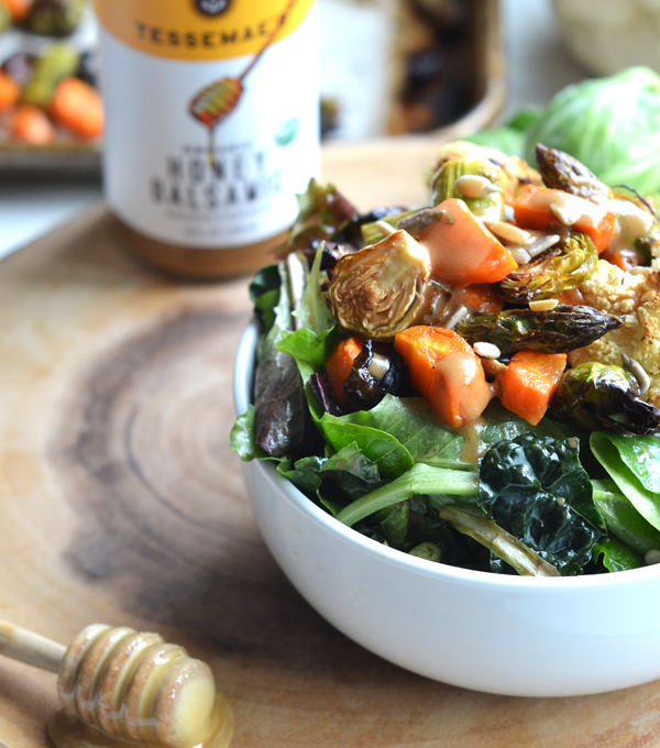 This Honey Balsamic Roasted Veggie Salad is a perfect way to get those vegetables in while tasting delicious! It is a paleo option that is vegetarian but you can easily add meat to make it a full meal!