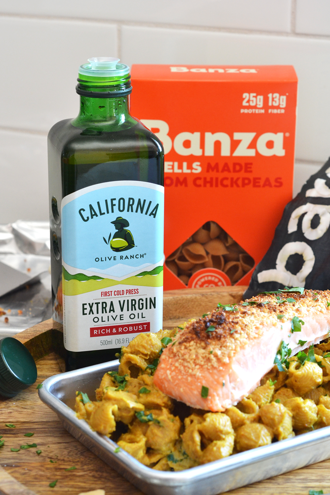 This Cashew Coconut Crusted Salmon over Creamy Curry Pasta Recipe is a dairy free and grain free dinner that is healthy and delicious!