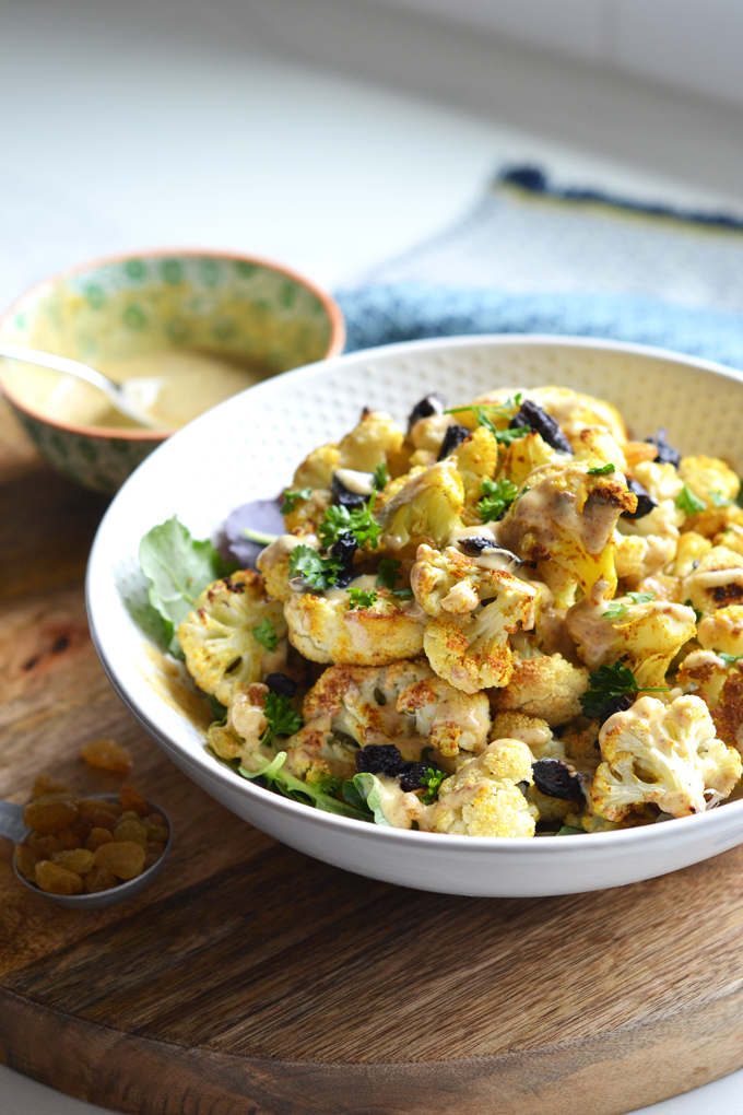 This Curry Charred Cauliflower with Honey Spice Yogurt Sauce is made Paleo & dairy free with almond milk yogurt and lots of cinnamon, turmeric and curry powder!