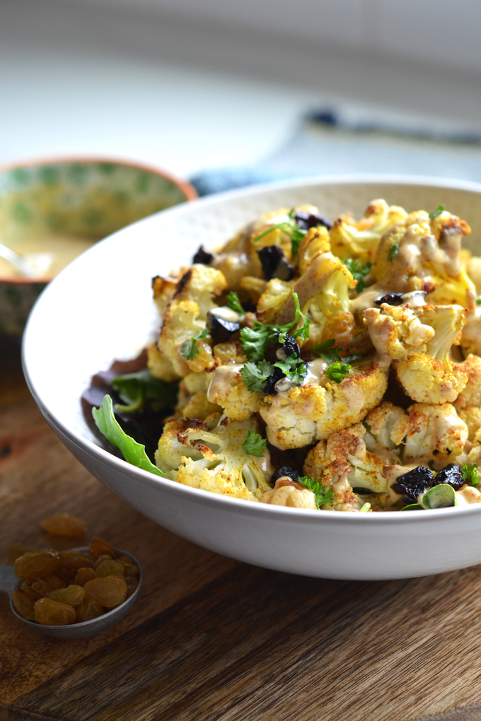 This Curry Charred Cauliflower with Honey Spice Yogurt Sauce is made Paleo & dairy free with almond milk yogurt and lots of cinnamon, turmeric and curry powder!