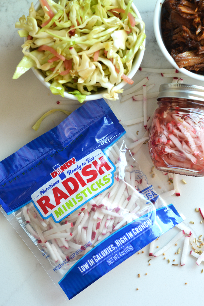 This Pulled Pork with Pickled Radish Coleslaw is a fun meal for spring and summer to preserve and use up those radishes! The pulled pork is full of flavor and comes together in a dutch oven!