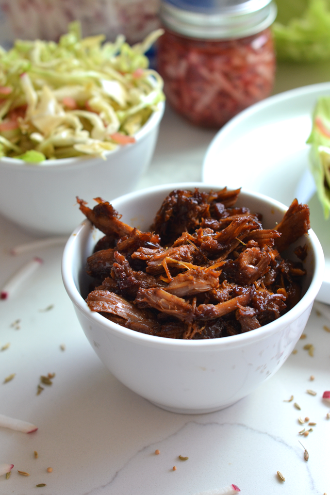 This Pulled Pork with Pickled Radish Coleslaw is a fun meal for spring and summer to preserve and use up those radishes! The pulled pork is full of flavor and comes together in a dutch oven!