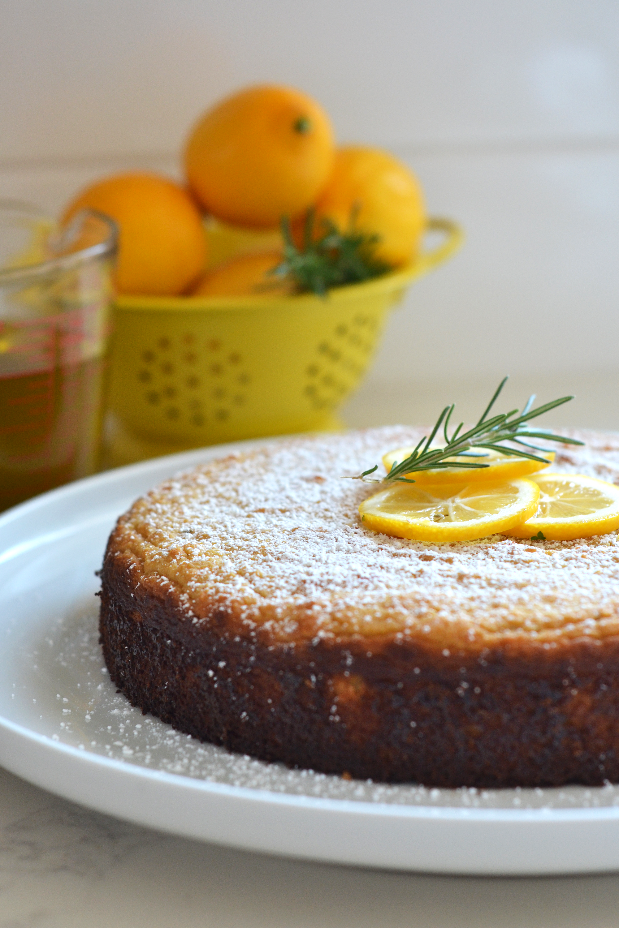 This Rosemary Meyer Lemon Olive Oil Cake is Grain free, refined sugar free and dairy free aka - Paleo! It has such fabulous flavor and is perfect for any party or brunch!