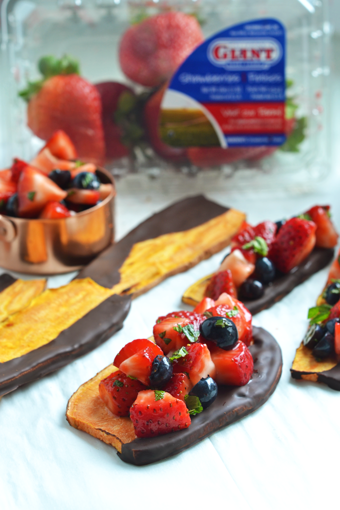 This Chocolate Dipped Sweet Potato Toast with Strawberry Salsa is the perfect way to enjoy sweet potatoes for dessert!! The simple strawberry salsa is made with California Giant Berry Farms strawberries and blueberries and tossed with honey and mint!