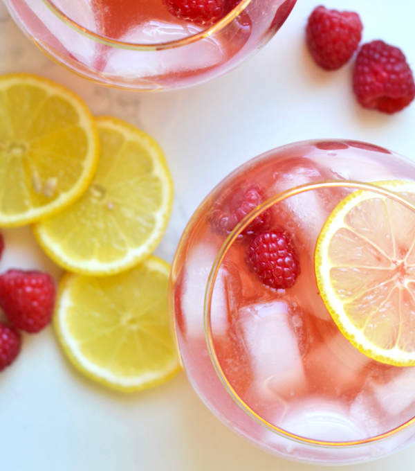 This Raspberry Lemon Kombucha Sangria is the perfect fresh way to celebrate the summer! Packed with flavor and probiotics!