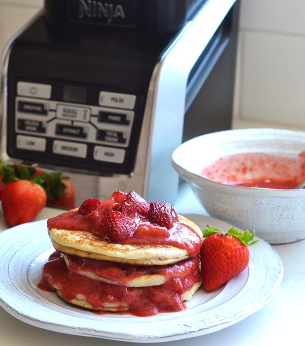 This Roasted Strawberry Vanilla Bean Sauce goes perfectly with these paleo and vegan pancakes and both recipes come together in a ninja blender!