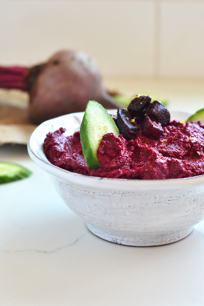 This Roasted Beet & Tahini Dip is the perfect way side dish to bring to any party! Paleo and vegan, there is no one that won't love it!