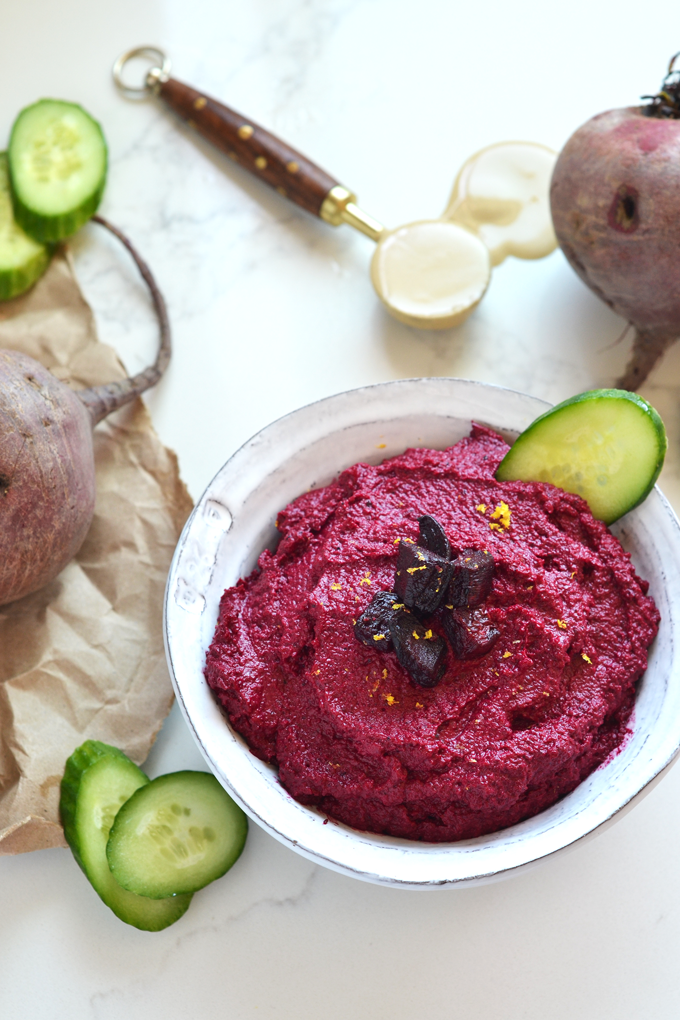 This Roasted Beet & Tahini Dip is the perfect way side dish to bring to any party! Paleo and vegan, there is no one that won't love it!