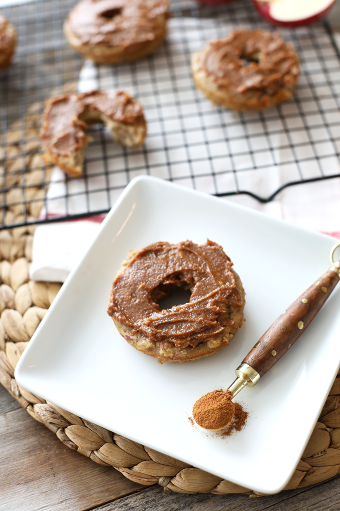 These Apple Spice Donuts are baked in a donut pan and so easy to make! They are paleo and have a clean and tasty frosting!